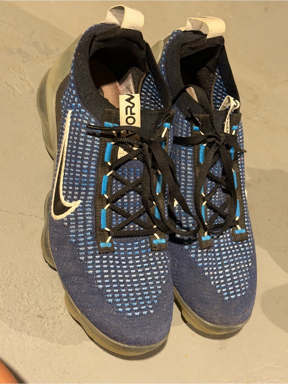 Nike Men’s Flyknit Sneakers in Navy Blue and Black with White Swoosh